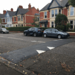 Complete rubber raised table installed on a residential street, providing full-width traffic calming.