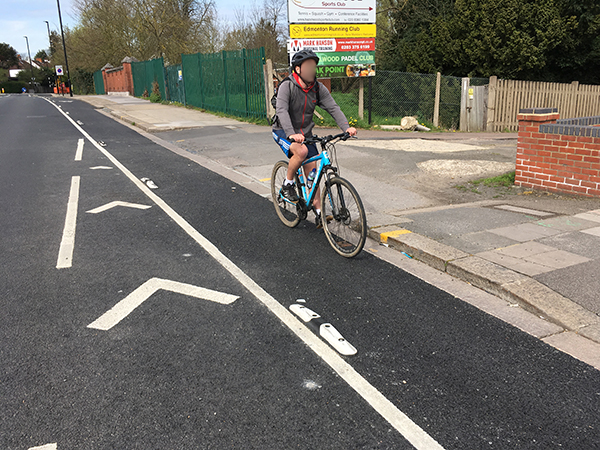 Mini Orca low-profile road separator installed to define a cycle lane alongside the main carriageway.