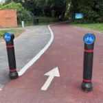 Raised line delineator installed alongside a segregated cycle lane to define the cycling route.