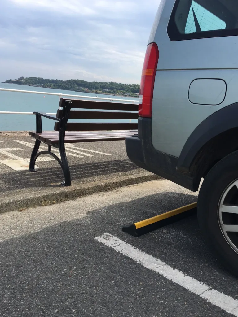 CarStop wheel stops installed in a car park to position parked vehicles.