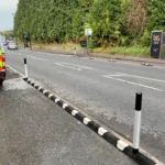 Installed Greenwich Wand Orca cycle lane separator with flexible bollards.