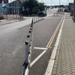 Installed Greenwich Wand Orca cycle lane separator with flexible bollards.