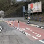 Kerb Orca units installed alongside RediKerb kerbing and flexible pole cones to create a segregated cycle lane at a junction.