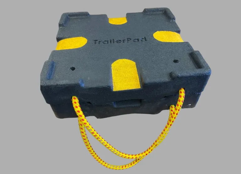 Stackable TrailerPads with high-visibility grip markings and integrated carry rope.