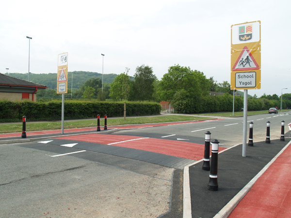 Installed combination raised table showing Traficop rubber edge modules with an infilled centre section for traffic calming