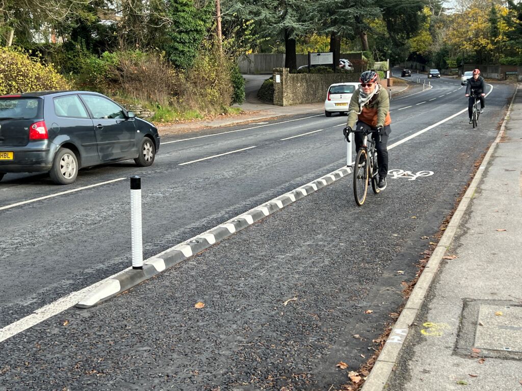 Installed Greenwich Wand Orca cycle lane separator with flexible bollards.