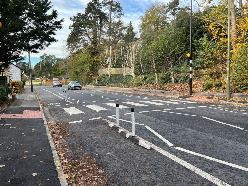 Installed Greenwich Wand Orca cycle lane separator with flexible bollards.
