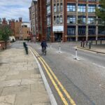 One-piece Wand Orca rubber lane divider installed on a city cycle lane to provide physical separation from traffic.”