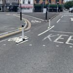 One Piece Wand Orca units with flexible wands installed along a segregated cycle lane on an urban road.