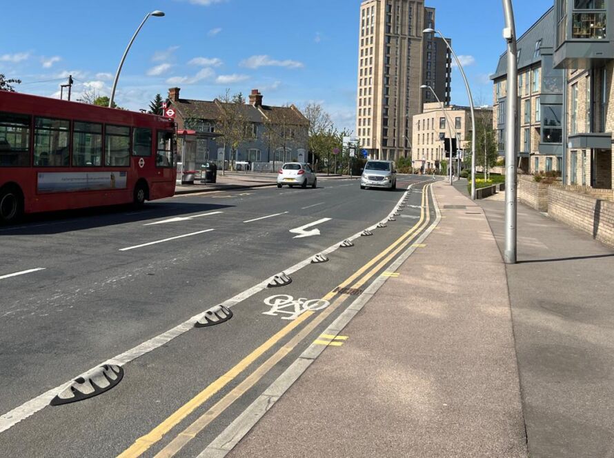 Orca Tip Toe rubber lane dividers used to delineate a cycle lane on a city street.
