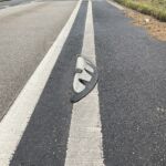 Orca zig zag lane divider installed along a cycle lane, showing angled rubber module with white reflective markings.