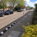 Installed Greenwich Wand Orca cycle lane separator with flexible bollards.