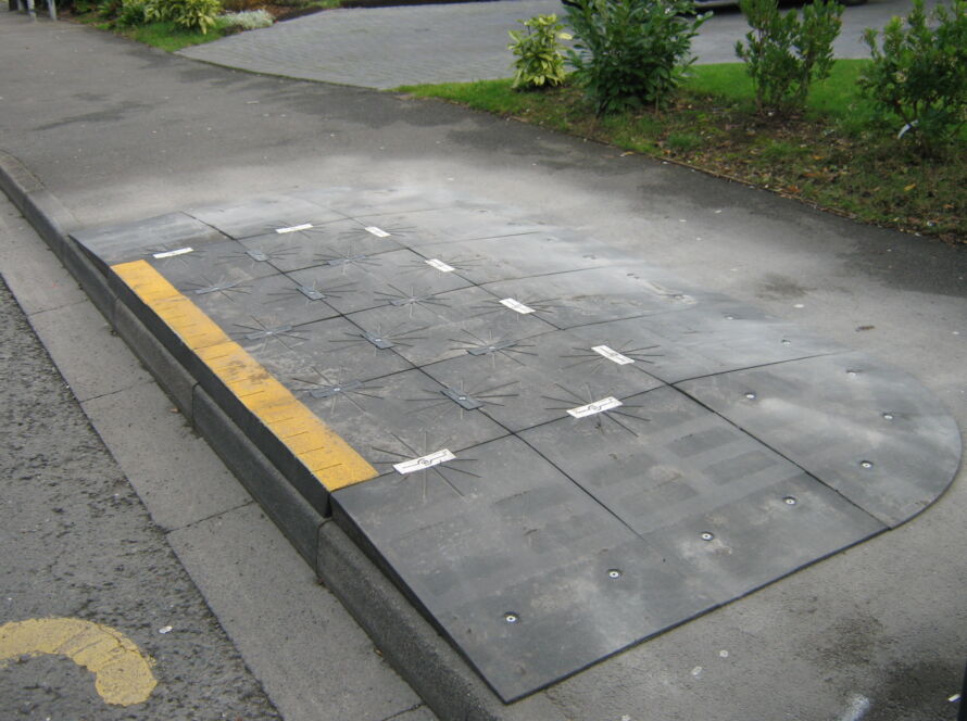 BusPad installed at a bus stop to create a level boarding area