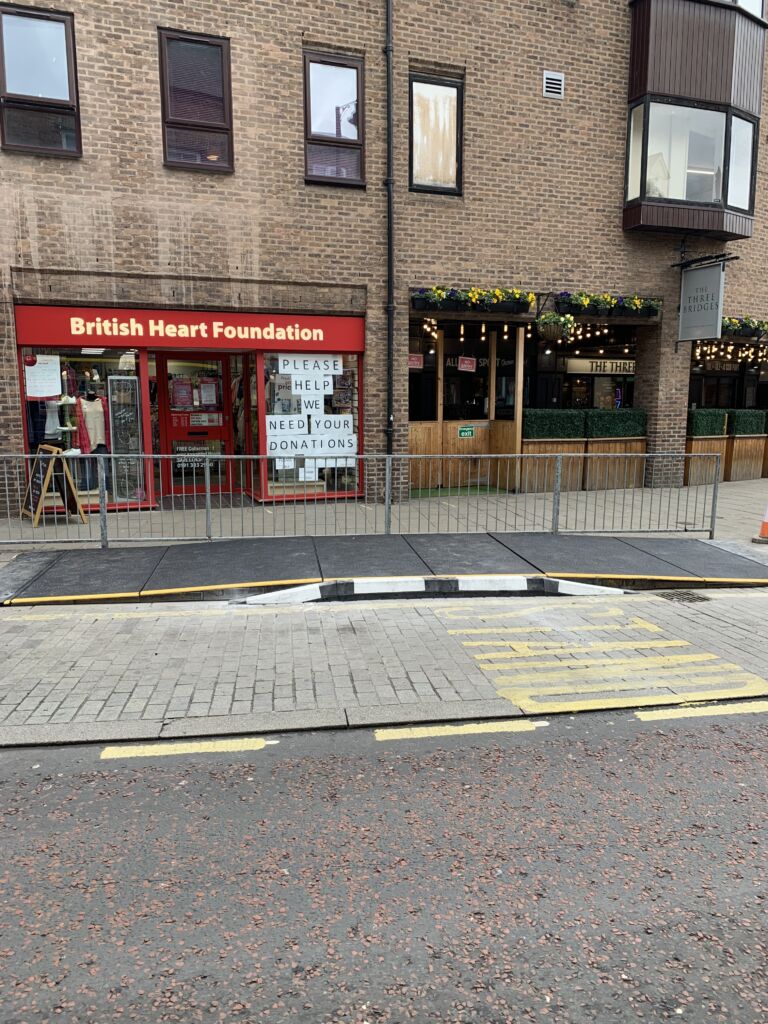 Modular bus ramp installed at the kerb to provide step-free access between the road and footway.