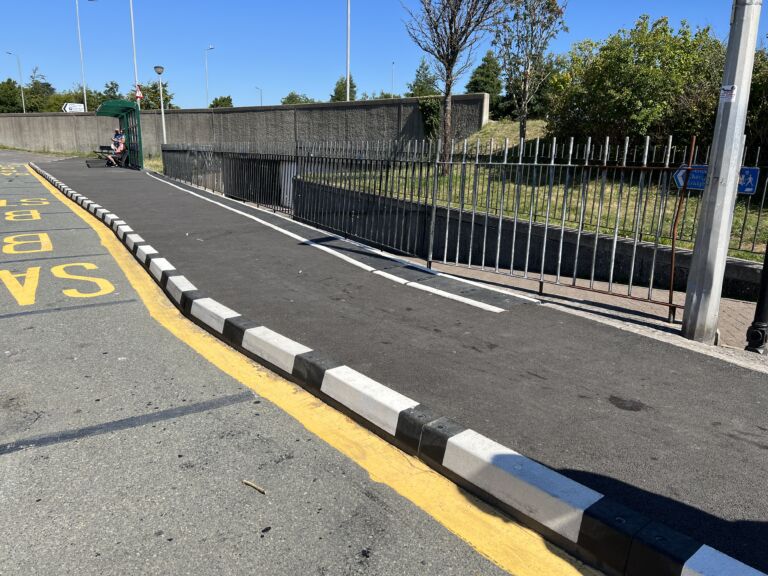 Harlow Kerb installed along a bus stop boarding area.