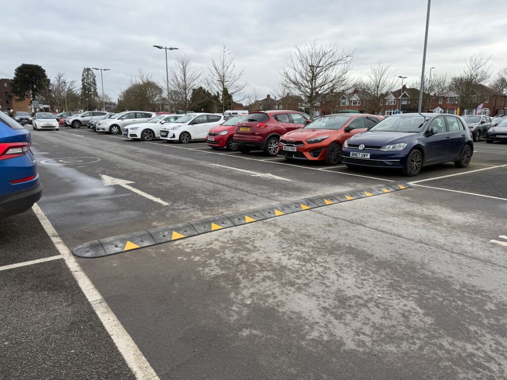 Sitecop modular speed ramp with high-visibility markings installed in a car park for traffic calming.