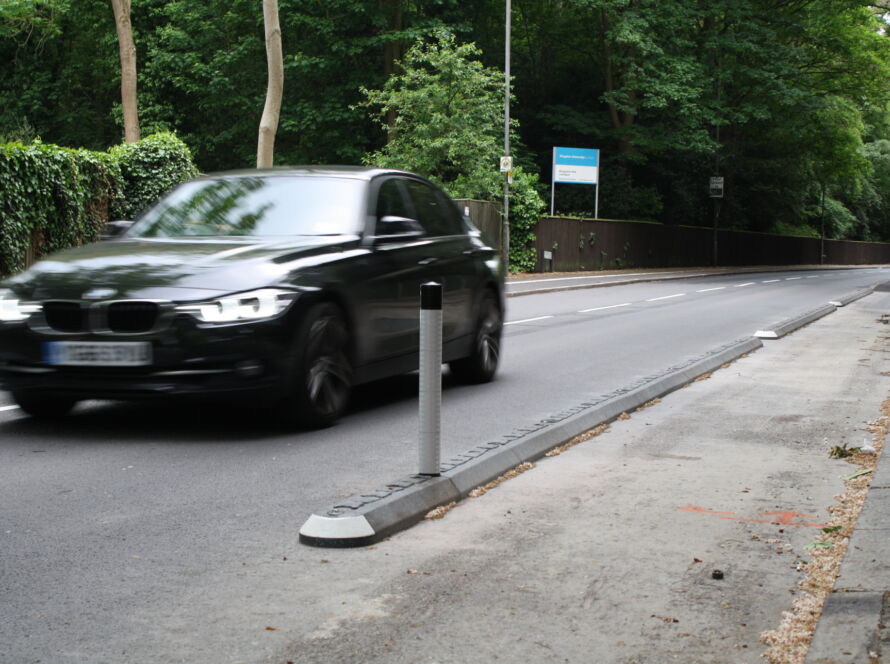 Milestone traffic island with reflective bollard installed to segregate traffic
