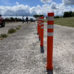 Off-highway pole cone installed on a concrete surface for demonstration purposes