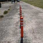 Off-highway pole cone installed on a concrete surface for demonstration purposes
