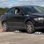 Off-highway pole cones returning upright after impact testing