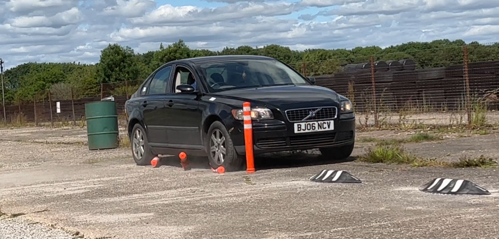 Off-highway pole cone bending during vehicle impact test