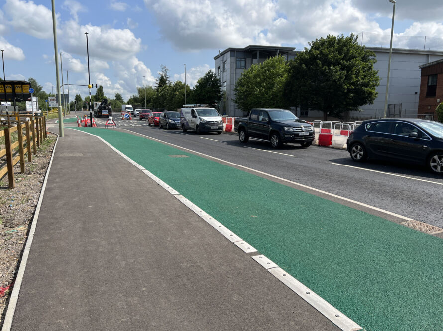 Raised line delineator installed alongside a segregated cycle lane to define the cycling route.