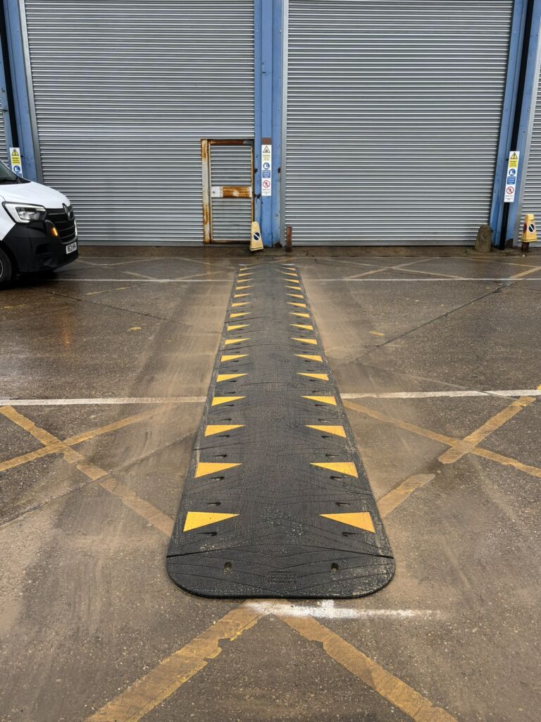 SitecopPlus speed ramp installed outside an industrial building.