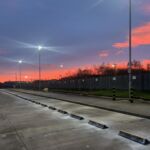 TruckStop 150 wheel stops installed in an industrial car park to prevent vehicle overrun.